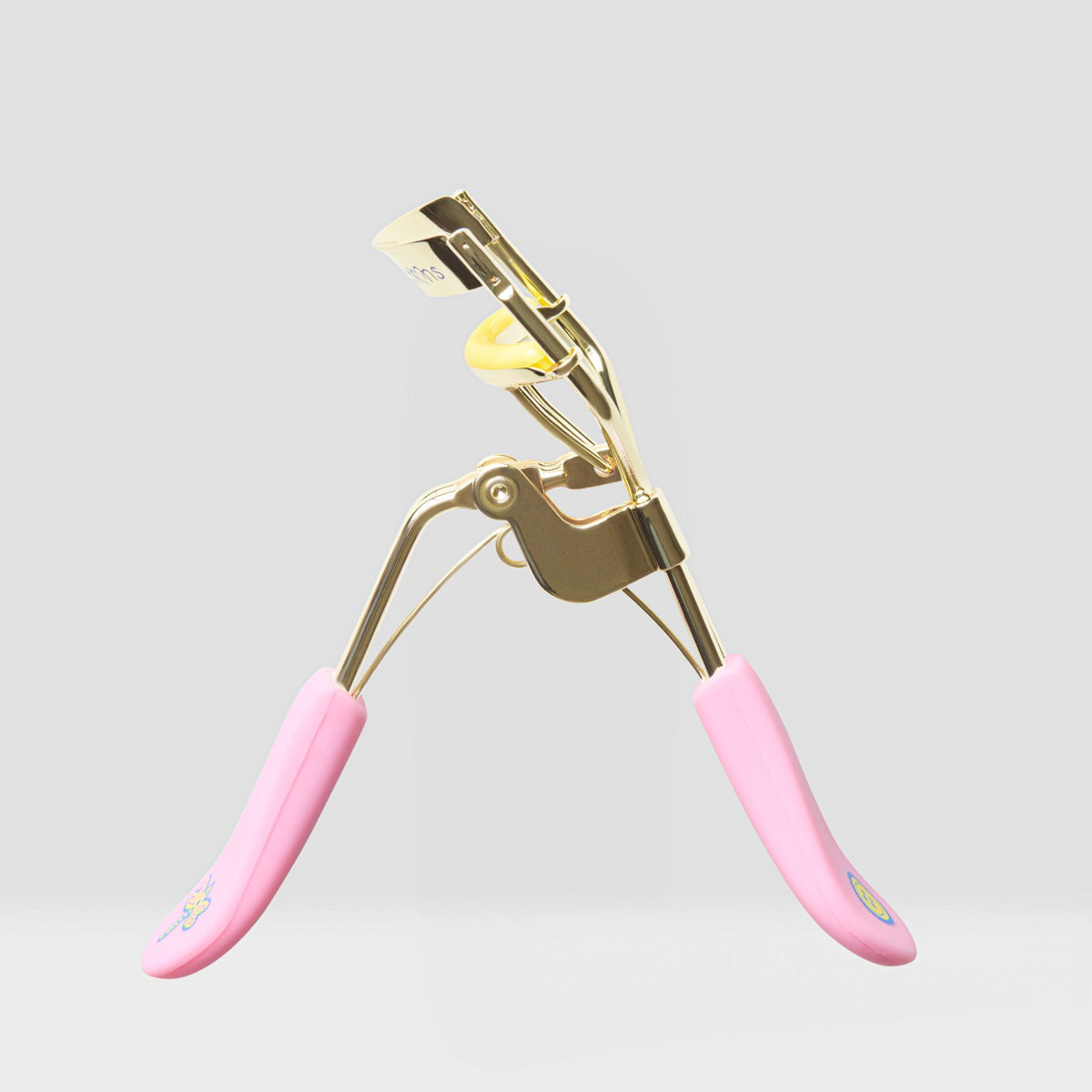 PRE-SALE - BEAUTY CREATIONS X CORALINE - ONE EYE OPEN EYELASH CURLER - 1PACK (12PCS)