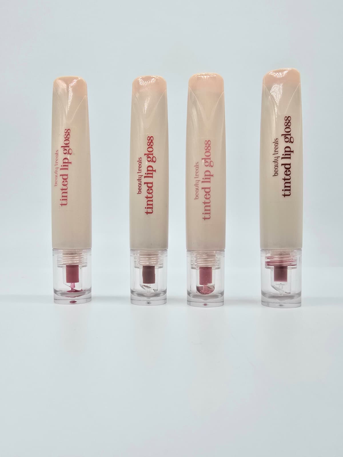 BEAUTY TREATS- 4 LUSCIOUS SHADES- TINTED LIP GLOSS-1PC