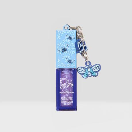 BEAUTY CREATIONS X TIM BURTON'S- CORPSE BRIDE VOL.2- BRIDAL VEIL- SHIMMER LIP OIL- 1PC