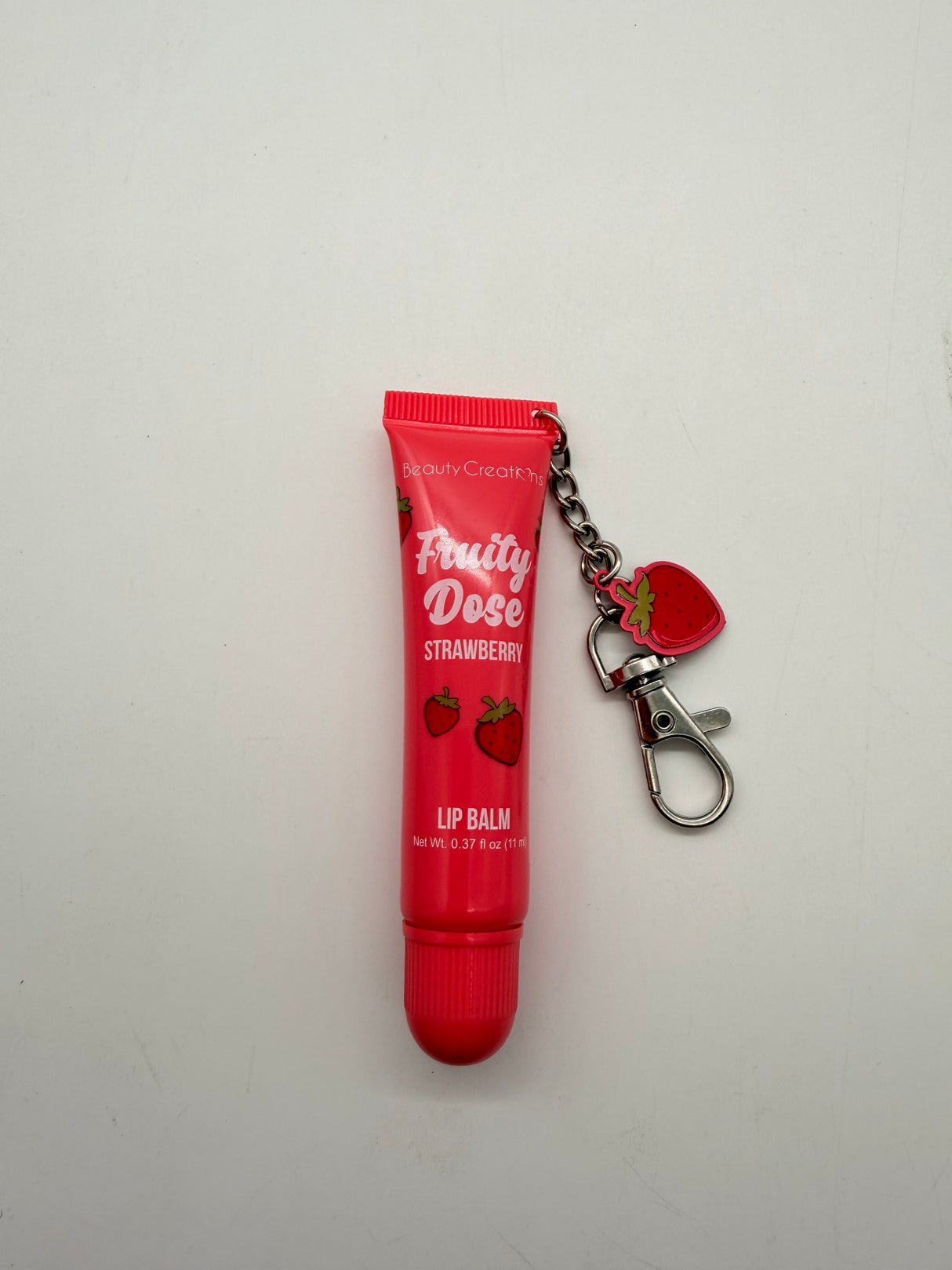 BEAUTY CREATIONS- FRUITY DOSE- LIP BALM WITH KEYCHAIN ( NEW FLAVOR )