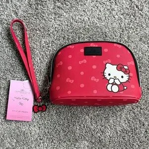 IMPRESSIONS VANITY X HELLO KITTY- WRISTLET POUCH- (1PC)